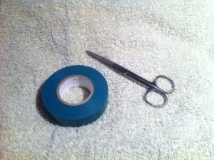 Tools required for the handcuff method: Electrical tape and a pair of scissors!